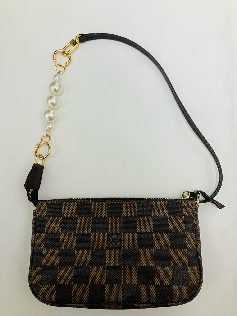 Louis Vuitton Damier Ebene Mini Pochette in Brown with dust bag